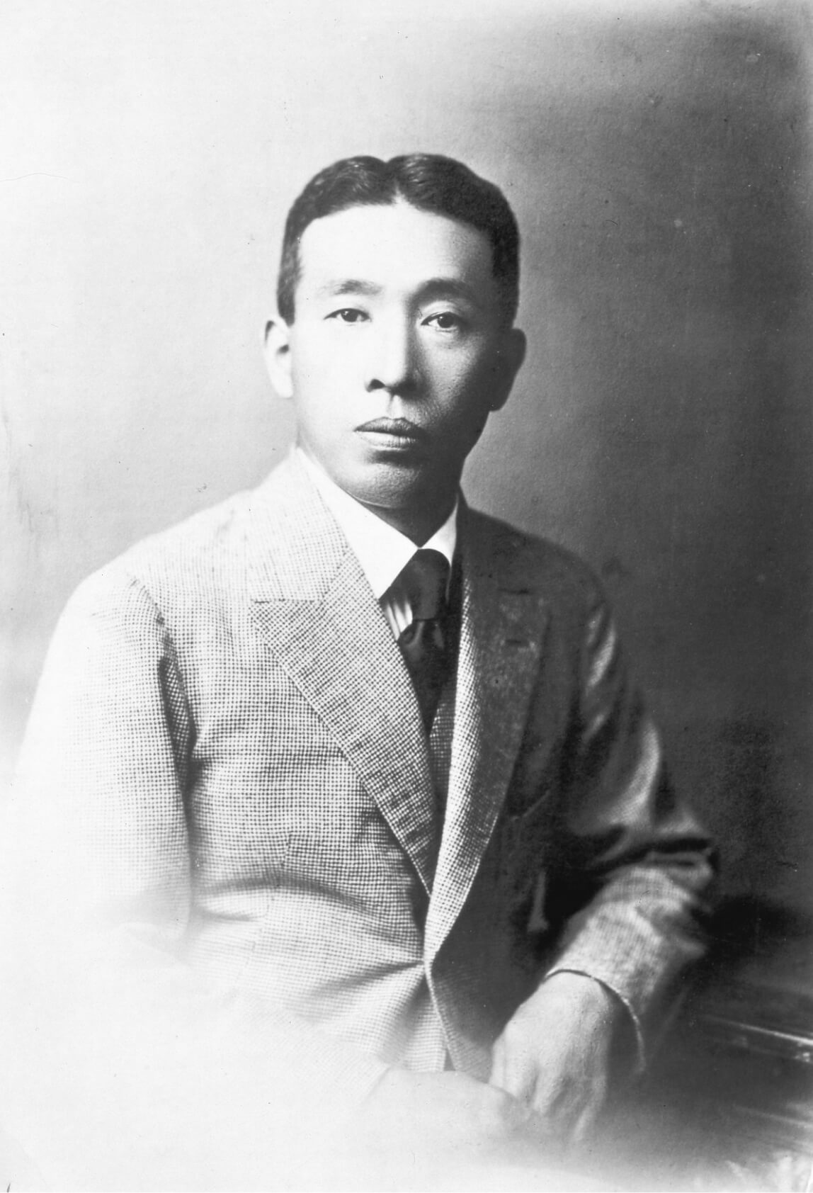 Black-and-white photo of Suntory founder Shinjiro Torii